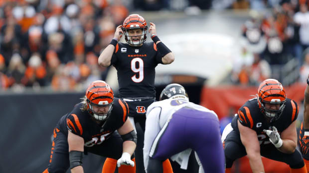Jan 8, 2023; Cincinnati, Ohio, USA; Cincinnati Bengals quarterback Joe Burrow (9) audibles at the line during the second quarter against the Baltimore Ravens at Paycor Stadium. Mandatory Credit: Joseph Maiorana-USA TODAY Sports